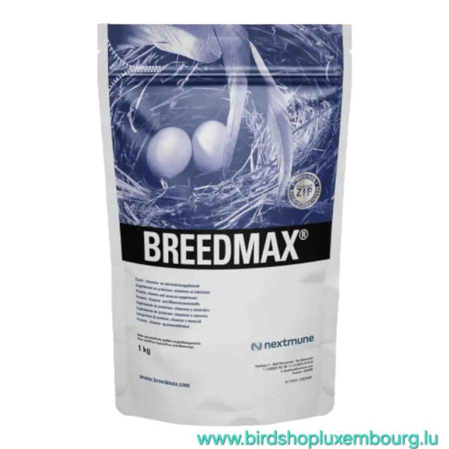 Breedmax 1kg - Protéines, Élevage de Nextmune présente un design bleu et blanc avec un nid d'oiseau contenant deux œufs. Pour plus d'informations, visitez l'URL sur l'emballage.