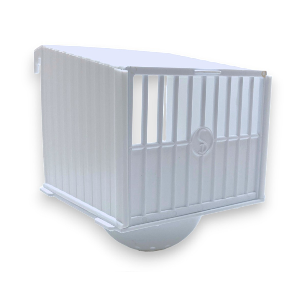 Nichoir en plastique blanc avec nid orange / beige / blanc