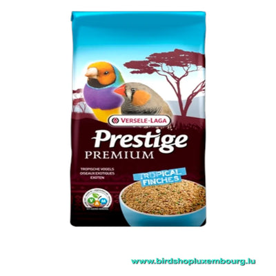 Un sac de 20 kg de nourriture pour oiseaux Versele-Laga Prestige Premium Tropical Finches présente des images vibrantes de Diamants Australiens et une boule de leur mélange de graines préféré, avec la marque et les détails du produit bien affichés.