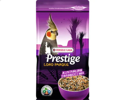 Un paquet violet et noir de Prestige Loro Parque Australian Parakeet Mix 1 kg de Versele-Laga présente une calopsitte et un bol de graines, mettant l'accent sur la nourriture spécialement conçue pour les perruches australiennes.